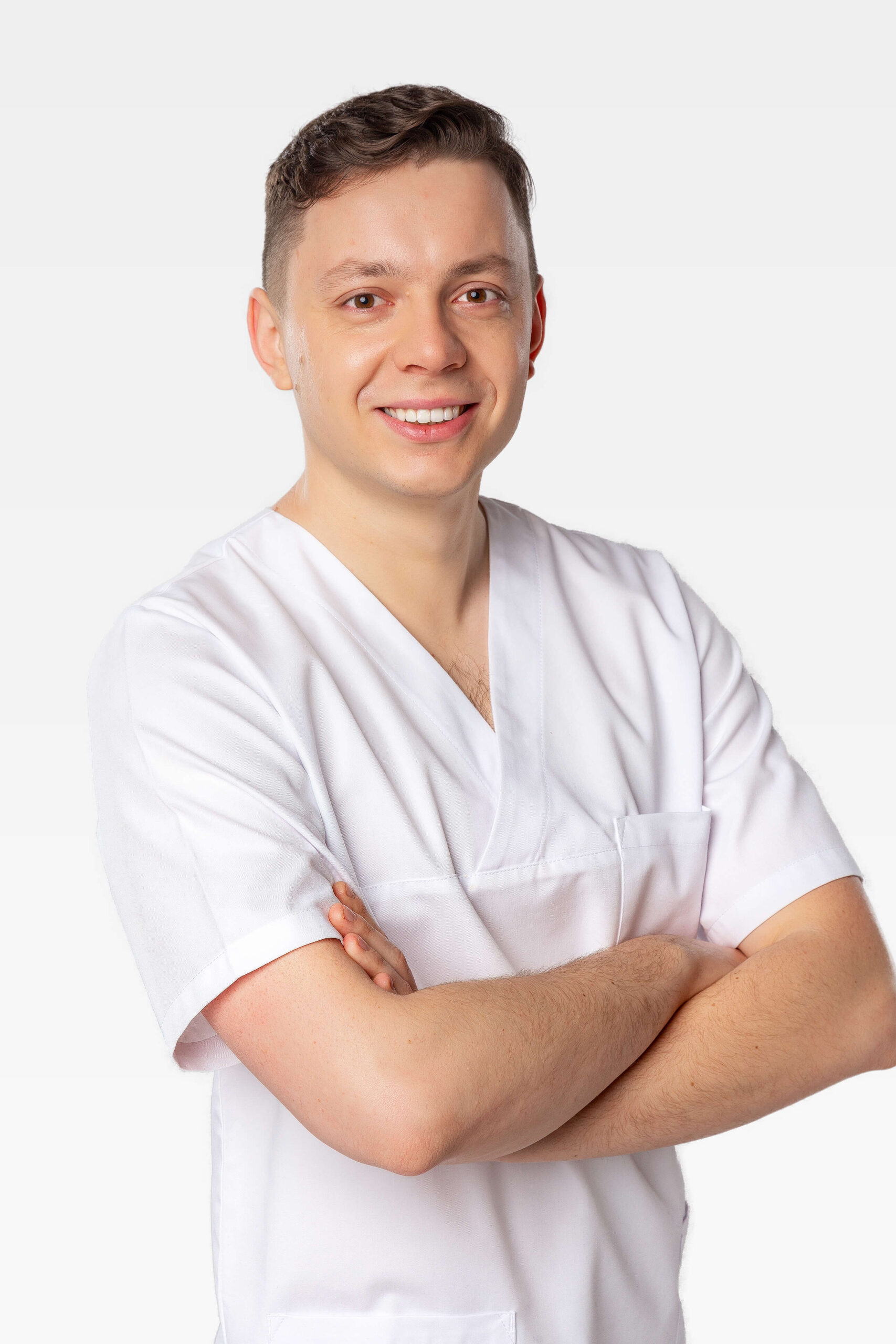 Tomasz Kaźmierczak Lekarz stomatolog Endodoncja Atelier Uśmiechu Warszawa Mokotów